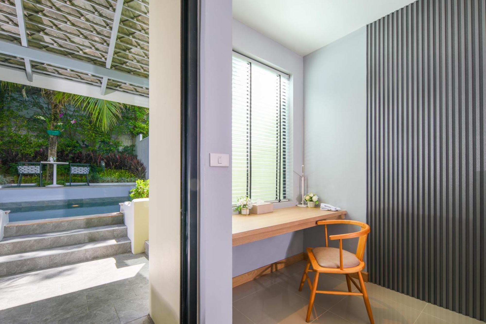Craft Resort & Villas, Phuket Town Exterior foto A study room in a landed property in Singapore