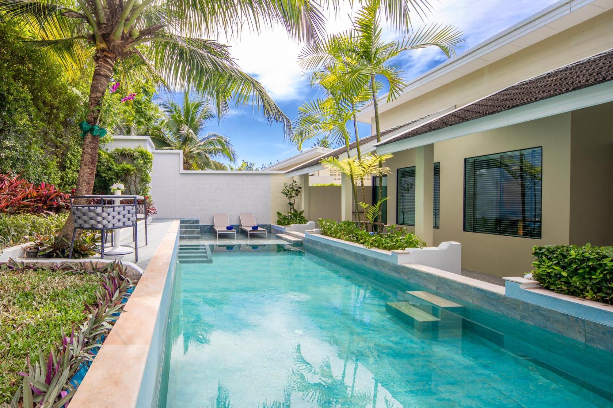 Craft Resort & Villas, Phuket Town Exterior foto The swimming pool at the hotel